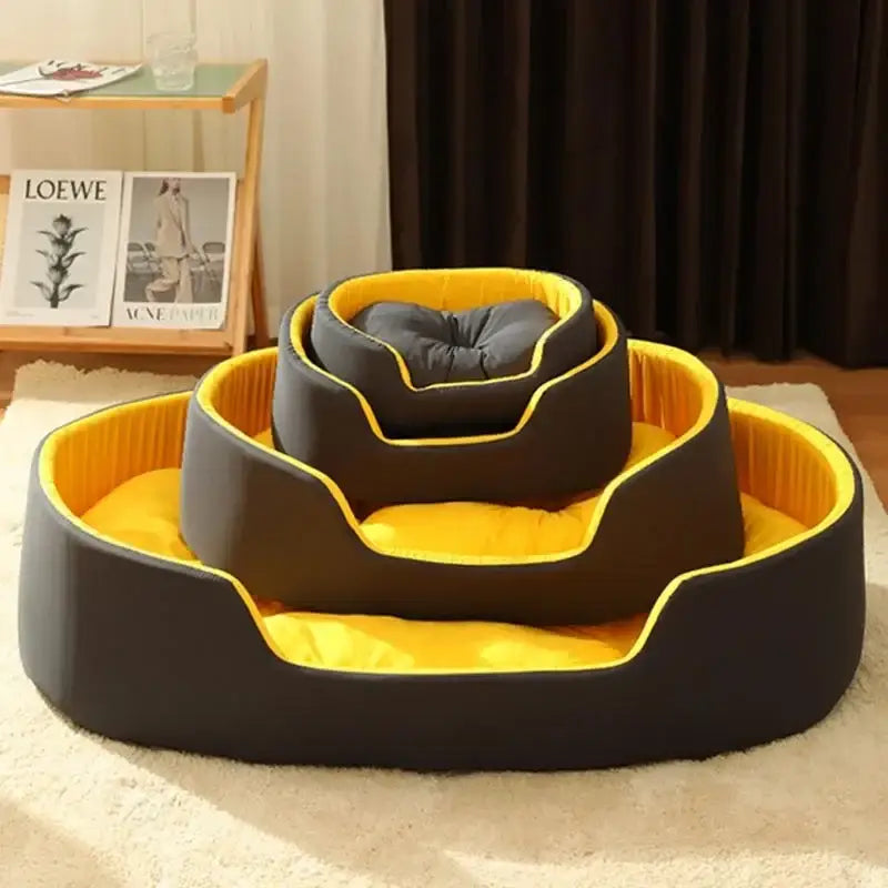 Nested set of gray and yellow pet beds forming a flower-like shape.