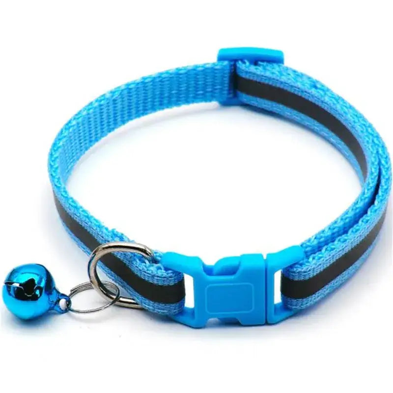 Blue and black striped cat collar with a bell and quick-release buckle.