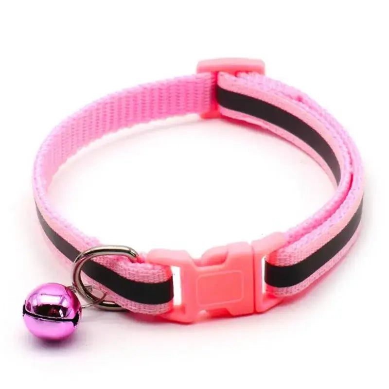 Pink and black striped cat collar with a small bell attached.