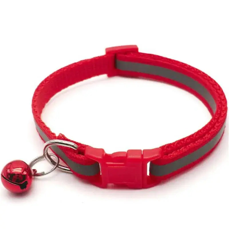 Red cat collar with a reflective stripe and small bell attached.