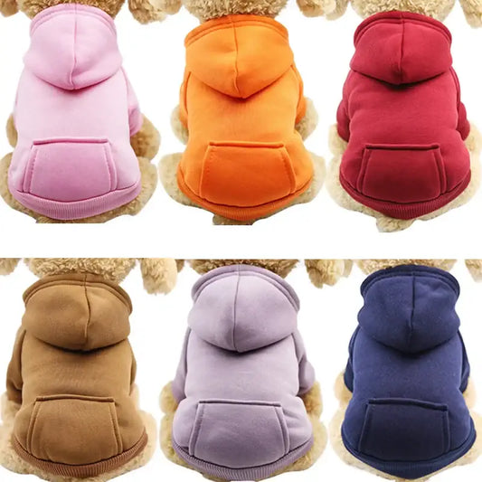 Colorful hooded sweatshirts for dogs in various shades.