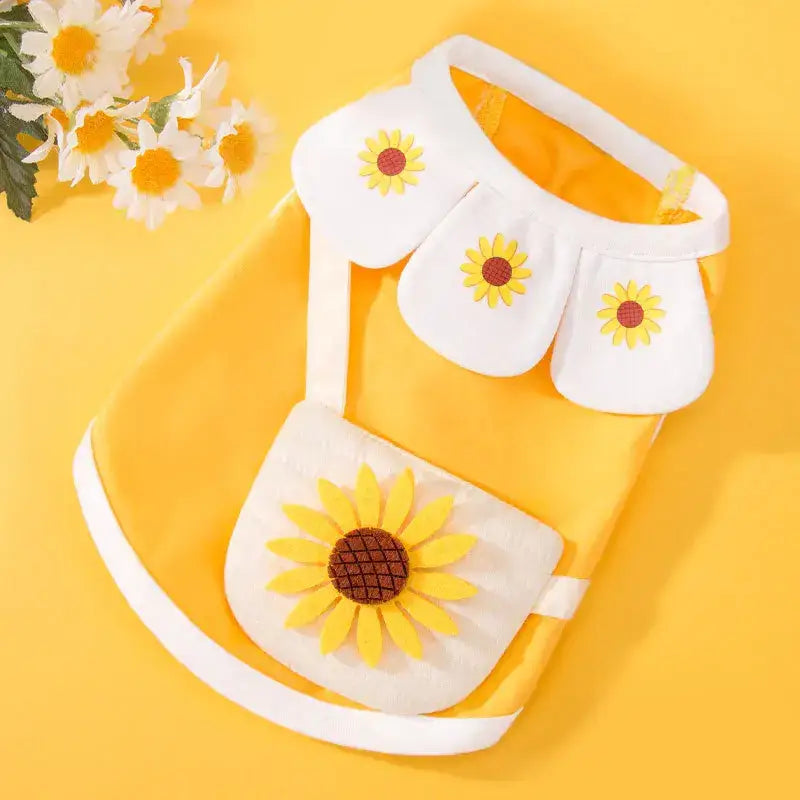 White dog-shaped bag with sunflower decorations.